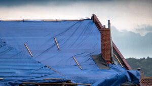 Emergency Roof Tarping Moves That Prevent Interior Ruin