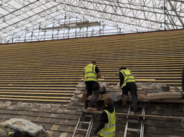 First Slates Installed on Listed Library Reroof The first Collyweston slates being installed on the Cornerstone roof
