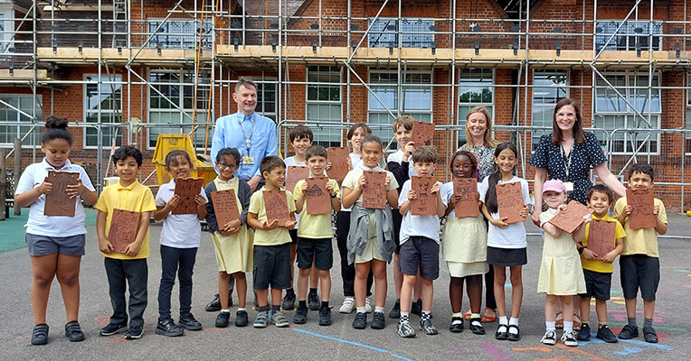 Pupils Create Time-Capsule Roof Tiles Ready for Re-Roof|Pupils Create Time-Capsule Roof Tiles Ready for Re-Roof|Alfred Sutton school 2|Pupils Create Time-Capsule Roof Tiles Ready for Re-Roof
