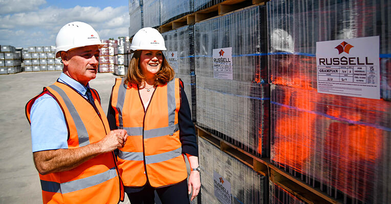 Andrew Hayward MD at Russell Roof Tiles giving tour of site to MP Kate Kniveton (002)
