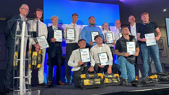 The BMI Apprentice of the Year Flat Roofing finalists on stage with their certificates