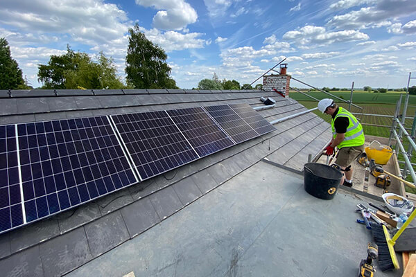 Solar panels installed on the Firth family's new roof