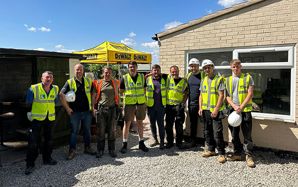 Band of Builders volunteer roofers