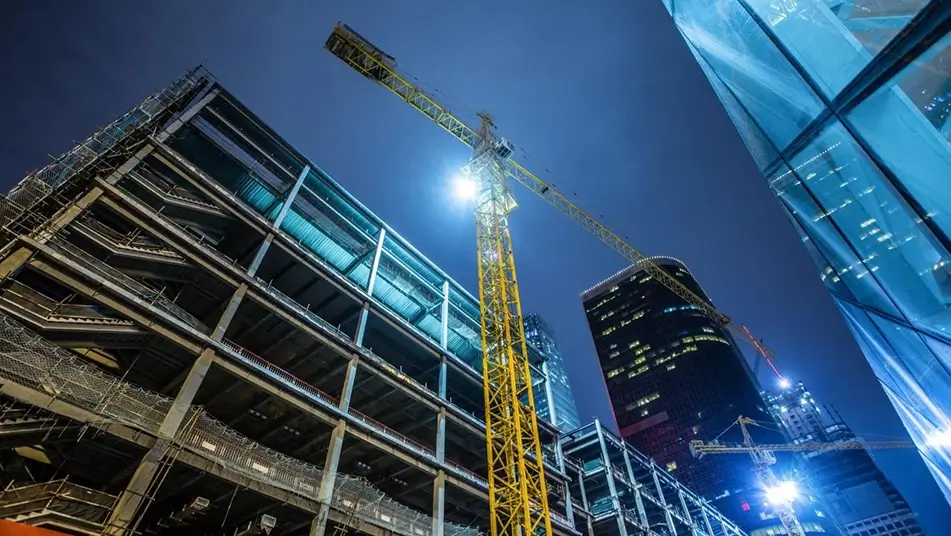 Construction site lit up at night