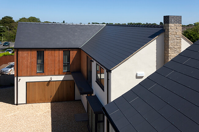 Aerial shot of Cedral slate roof in the sun