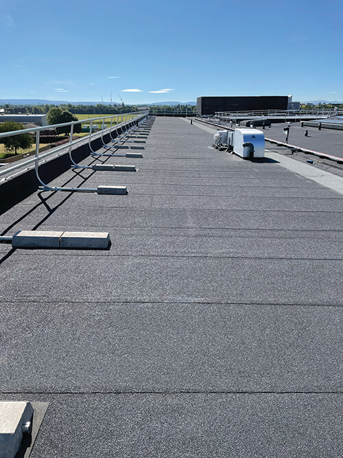 Chesterfelt bituminous roof system installation