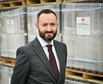 headshot of man in suit