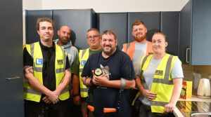 Band of Builders Installs New Kitchen for Builder with MS