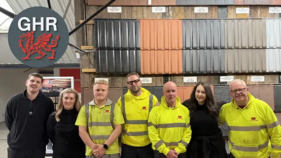 The Gordon H Richards team in front of their Low Pitch Roof Tile display area.
