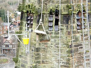 Bosuns chair attached to the church steeple