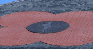 Banksy Roofer Commemorates Fallen with Slate Poppy Roof