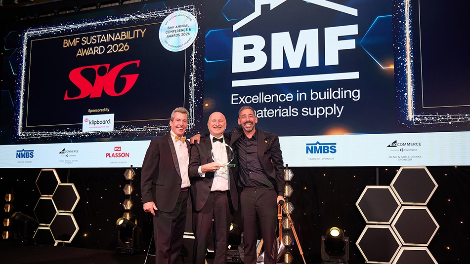 SIG on stage presented with award
