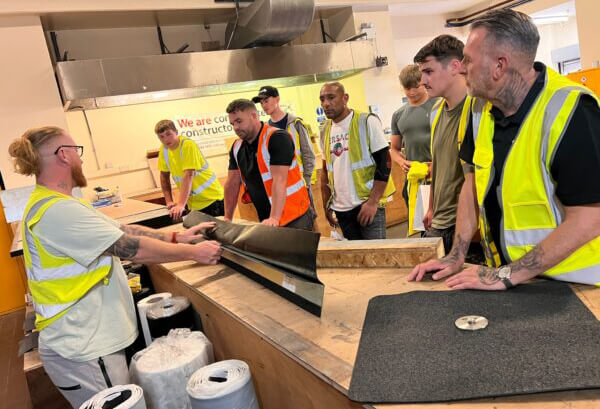 Simian waterproof membrane apprentices watch product demonstration at IKO 