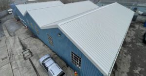 Asbestos Metal Overclad for Busy Transport Depot