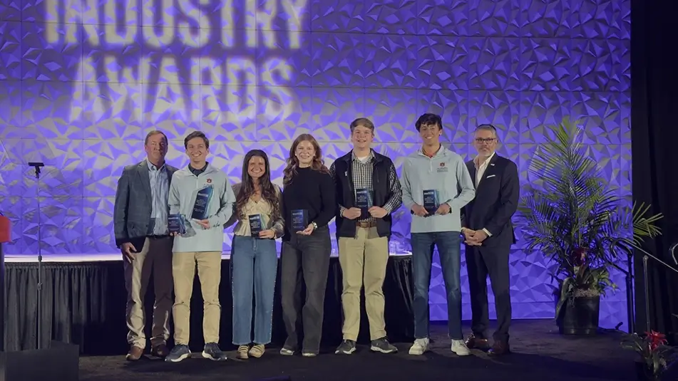 The student competition winners on stage