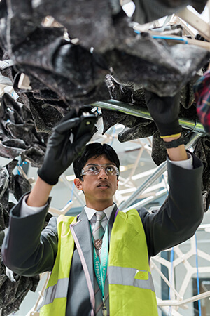 Student using roofing geotextile for design