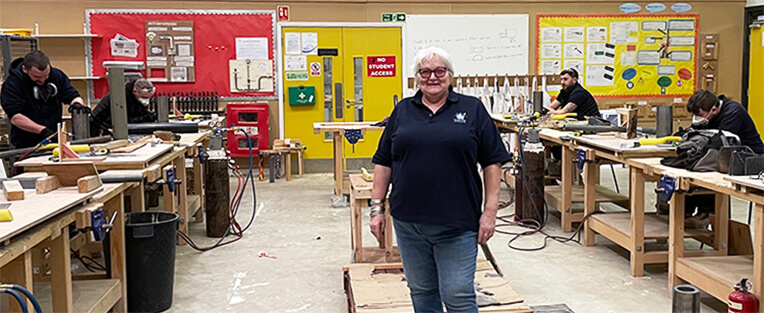Denise with training delegates|Stewart Rowles supervising training|Training