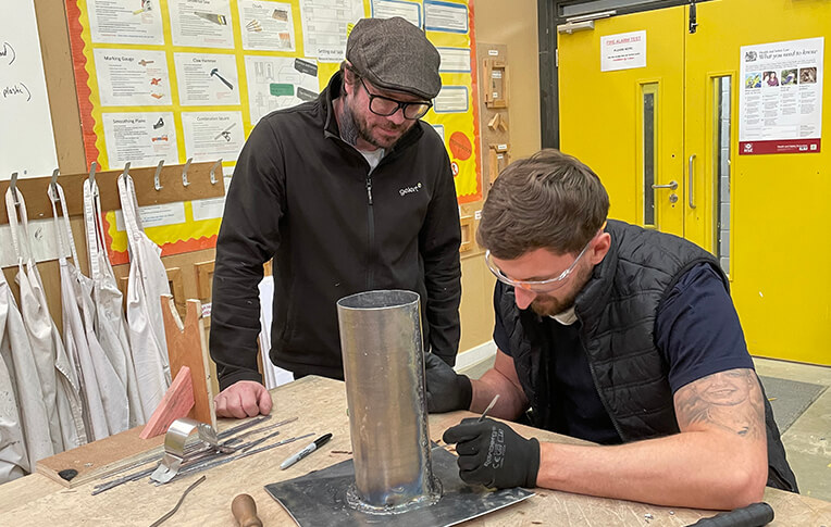 Stewart Rowles supervising training