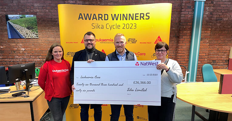 Sika Presents £26k Cheque to Leukaemia Care